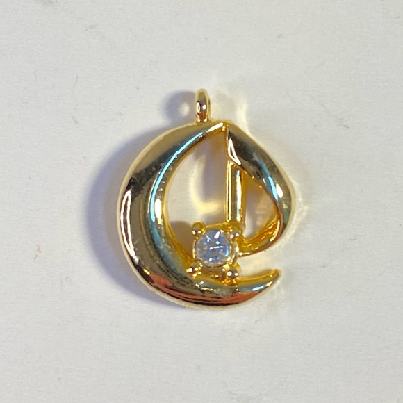 Vintage Jewelry - Vintage abstract gold tone pendant with rhinestone accent